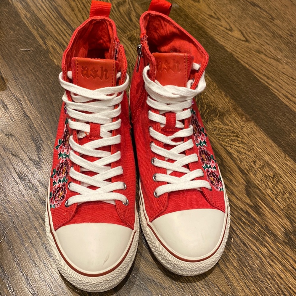 Ash converse style shoe. Red with embroidered side. Side zipper. Worn once